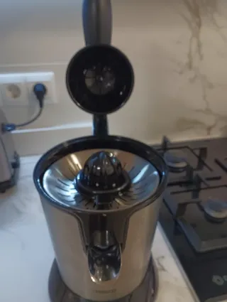 Exprimidor de acero inoxidable