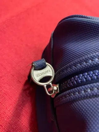 Borse Lacoste, una nera piccola e una blu grande