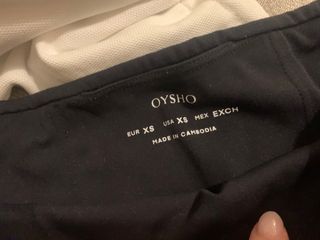 Conjunto deportivo Oysho negro y blanco