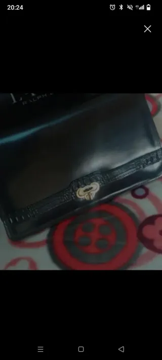 Bolso negro piel con cierre dorado