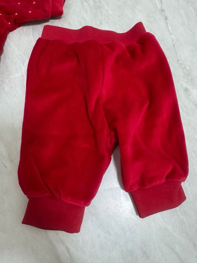 Tuta neonato rossa stelle