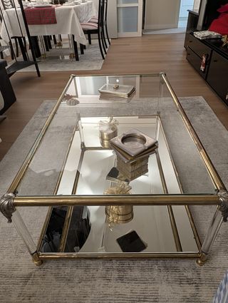 Mesa de centro cristal y metal dorada