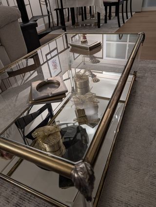 Mesa de centro cristal y metal dorada