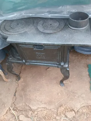 Estufa araña de metal negra