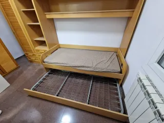 Armario modular con cama y estanterías