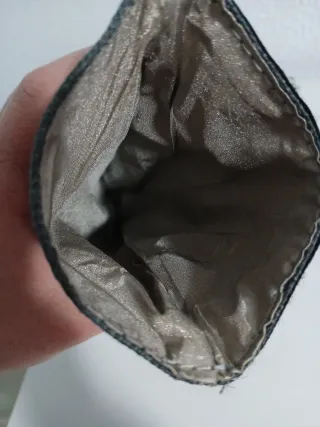 Bolsita Faraday Gris con Cierre Naranja