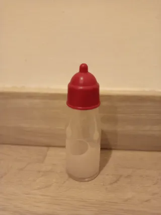 Nenuco con trona, ropa y biberón