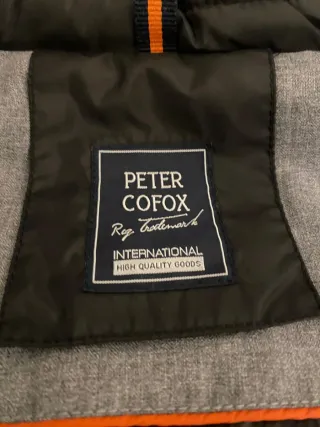 Abrigo gris acolchado