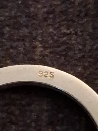 Onza de plata y 100 pesetas