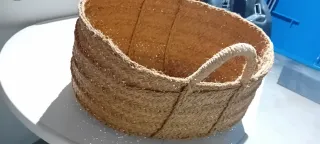 Cesta de mimbre para leña
