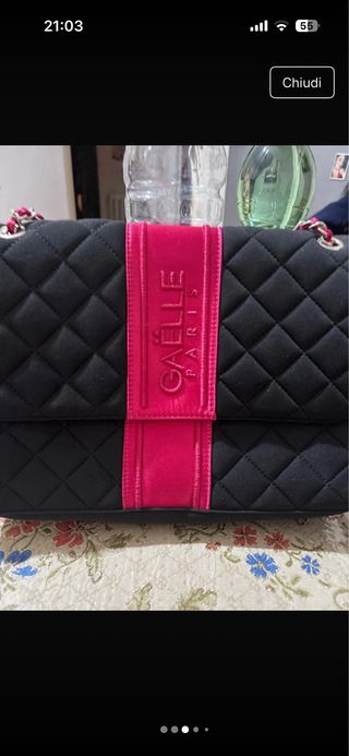 Borsa Gaëlle nera con dettagli fucsia