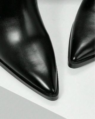 Botas altas de tacón negras