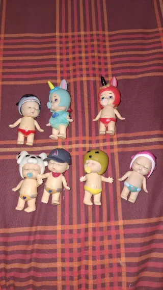 Lote 7 figuras bebés miniatura