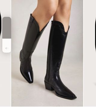 Botas altas de piel negras