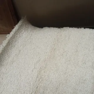 Vendo dos alfombras de lana blanca 1x0.5m nuevas