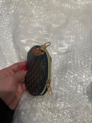 Monedero redondo estampado