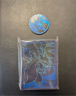 Sleeve + moneta Charizard