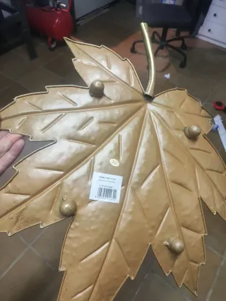 Centro de mesa hoja metal dorada