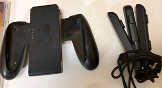 Nintendo Switch con accesorios sin cargador