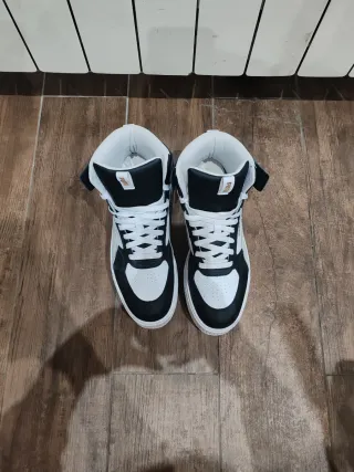 Puma alte Platform nere e bianche