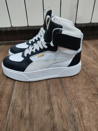 Puma alte Platform nere e bianche