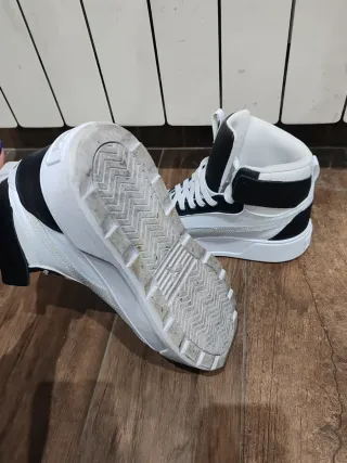 Puma alte Platform nere e bianche