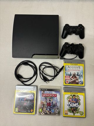 Consola PS3 con 2 mandos y 3 juegos