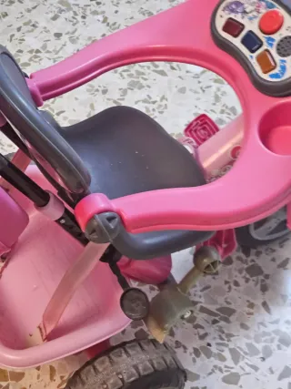 Triciclo infantil rosa con toldo