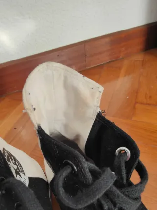 Converse caña alta bicolor negras y blancas.