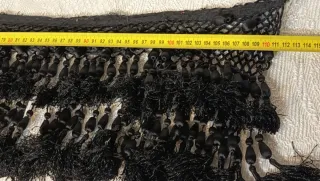 Pasamanería antigua con borlones