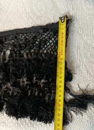 Pasamanería antigua con borlones