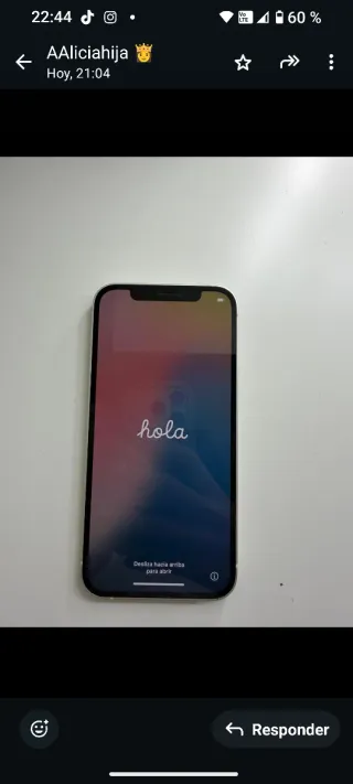 iPhone 12 blanco,128 GB, batería al 75 por cien