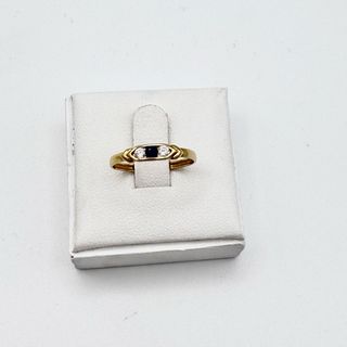 Anillo oro 18kt con zafiro y circonitas