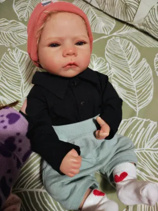 Bebés reborn, con mucha ropa, capazo, arrullo.