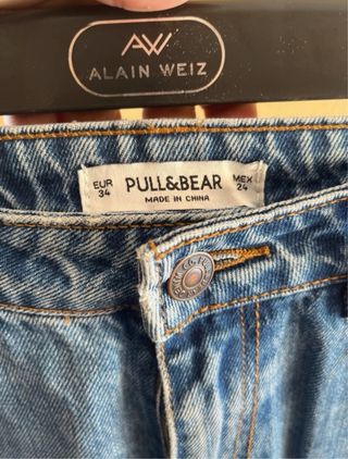 Pantalón vaquero tiro alto con raya lateral