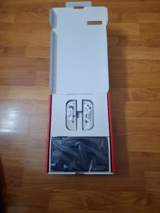 Nintendo Switch OLED no tiene cable corriente