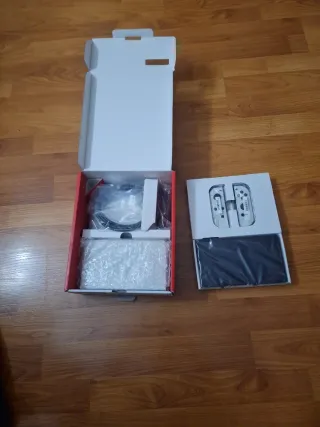 Nintendo Switch OLED no tiene cable corriente