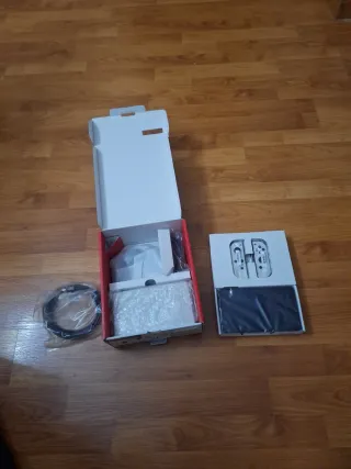 Nintendo Switch OLED no tiene cable corriente