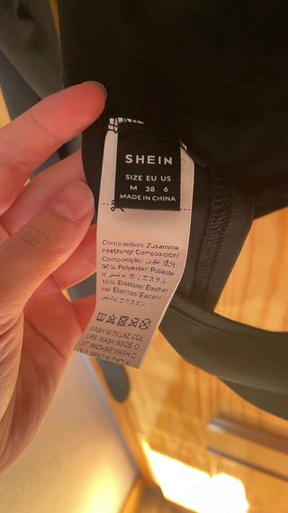 Top negro manga larga espalda descubierta