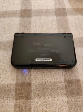 Nintendo 3DS XL Negra + Funda + 2 Juegos