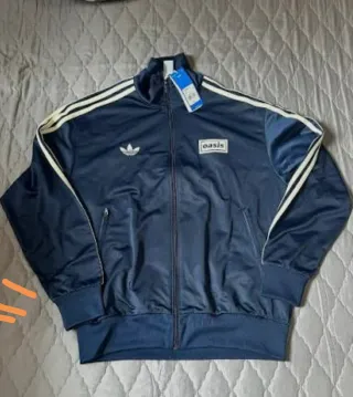 Chaqueta Adidas Oasis Live '25 New Jersey