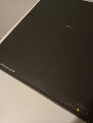 PS4 (PlayStation 4) con 2 mandos y GTA V