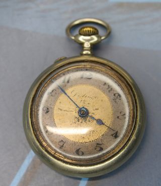 Antiguo reloj de bolsillo Distinguo. Funciona. 50 mm.