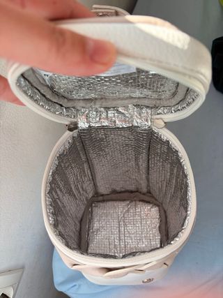 Cambiador portátil + guarda biberon + colonia bebé