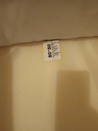 Minicuna con ruedas y textiles