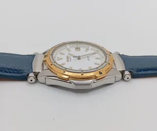 Reloj Seiko SQ 100 Oro y acero