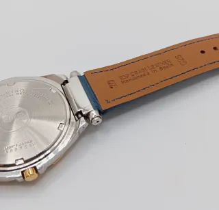 Reloj Seiko SQ 100 Oro y acero