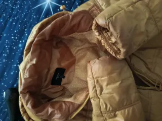 Piumino donna giallo con cappuccio