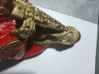 Figura antigua chino con flauta de pan