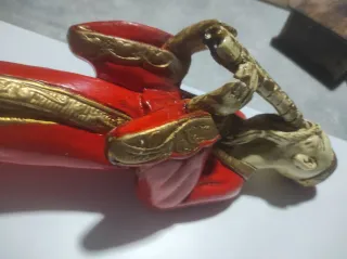 Figura antigua chino con flauta de pan